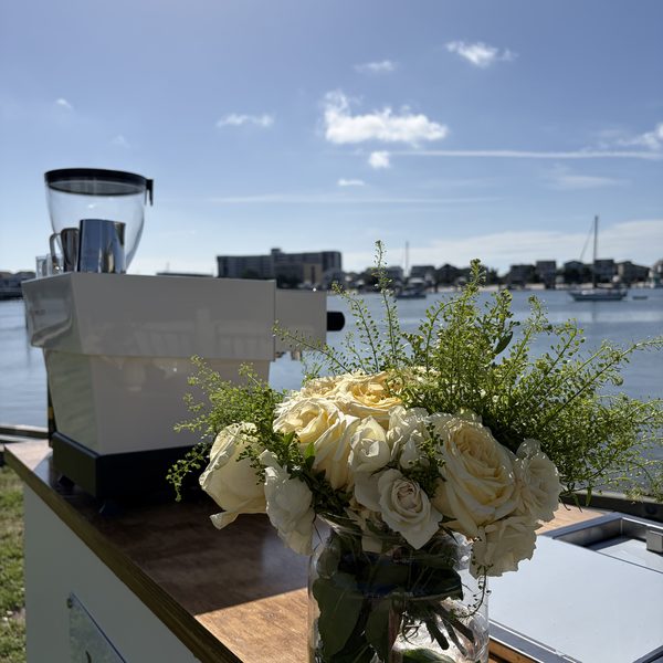Flowers and the wood counter of the cart